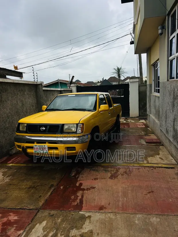 Nissan Frontier SE-V6 4x4 King Cab 2000 Yellow - 1
