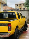 Nissan Frontier SE-V6 4x4 King Cab 2000 Yellow - 3
