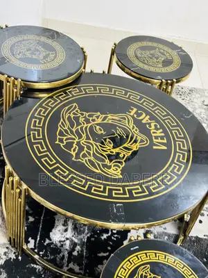 Modern Center Table - An Amfani, Stainless Steel Frame, Glass Top