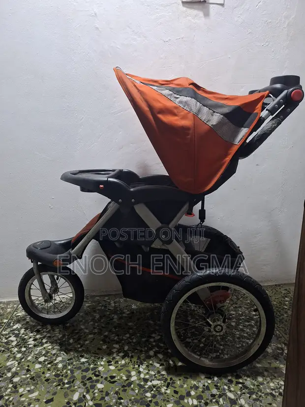 Orange Used Child Stroller - 1