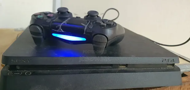 PlayStation 4 Slim 500GB with 2 Controllers & 7 Games - 1