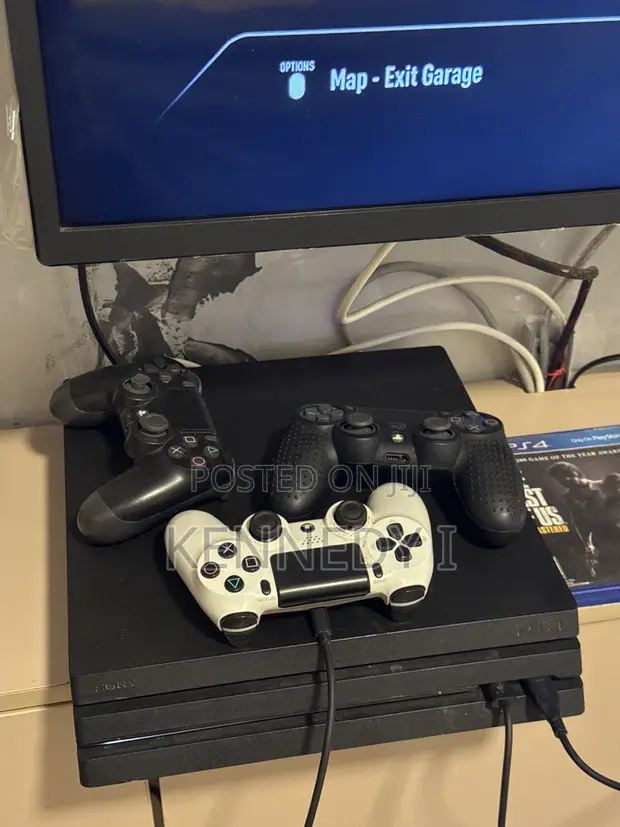 Used Sony PS4 Pro 1TB with Accessories - 1