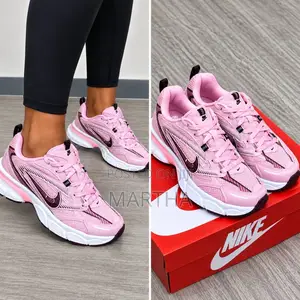 Nike 574 Luxury Pink Sneakers - Women's