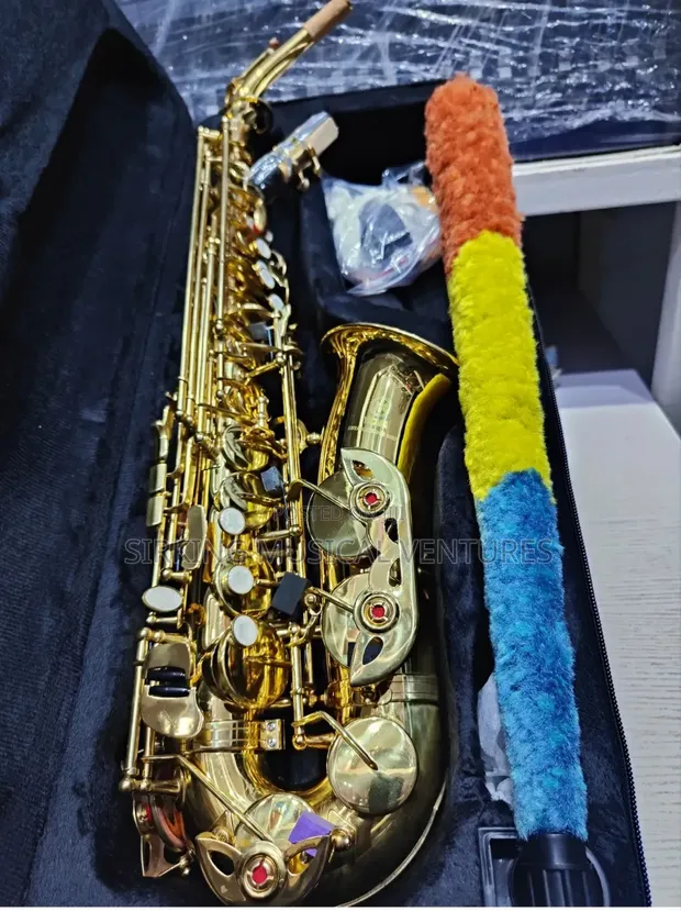 Brand New Gold Yamaha Alto Saxophone - 1