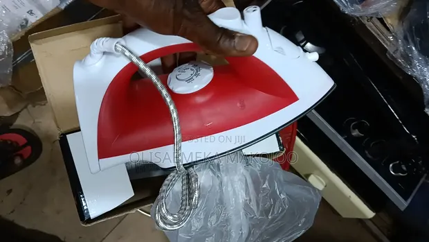 Brand New Mid-Size Steam Iron - 1