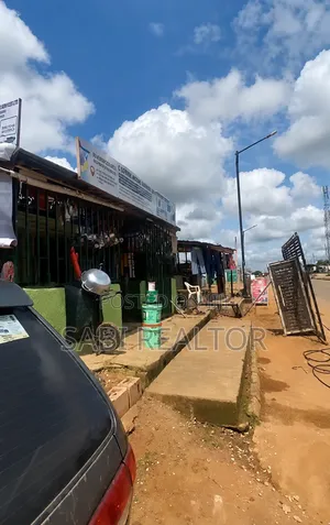 2 Plots Mixed-Use Land with 5 Shops, Ayobo