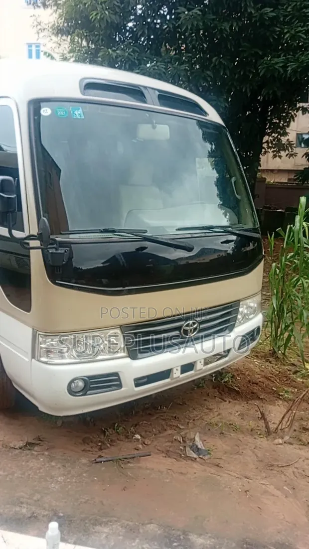 Toyota Coaster Bus 2022 Gold - 1
