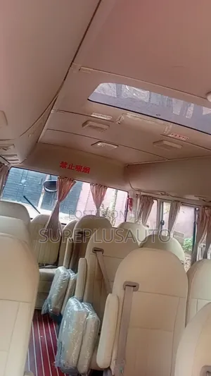 Toyota Coaster Bus 2022 Gold