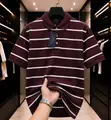 Tommy Hilfiger Men's Green Stripe Polo Shirt - 1