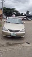 Toyota Camry 2004 Zinariya - 1