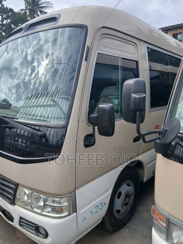 Toyota Coaster 2017 - Brown - 1