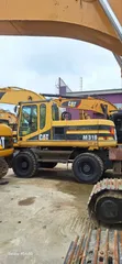 Caterpillar M318 Wheel Excavator - 3
