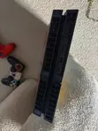Used PlayStation 4 Slim (500GB) with 16 Games & Controllers - 2