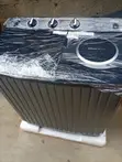 LG Fully Automatic Top Load Washing Machine - 1