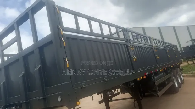 CNHTC Howo Sided Body Triple Axle Trailer - 1