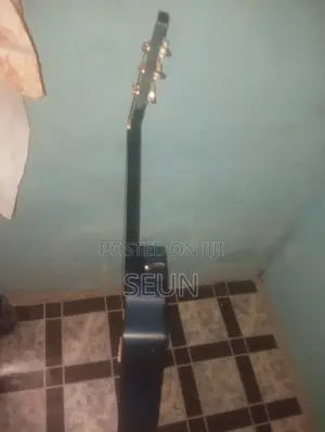 Used Blue Acoustic Guitar