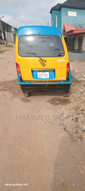 Suzuki Every 2012 Yellow Bus