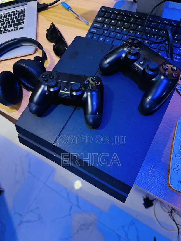 Used Sony PlayStation 4 (PS4) Fat 1TB Console with 10 Games & 2 Controllers - 1