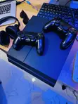 Used Sony PlayStation 4 (PS4) Fat 1TB Console with 10 Games & 2 Controllers - 1