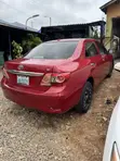 Toyota Corolla 2010 Red - Tokunbo, First User - 2