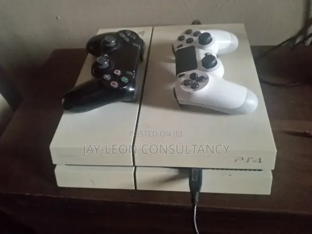 PlayStation 4 with 2 Controllers - 1