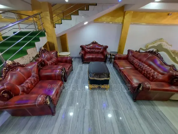 Home Interiors Royal Leather Sofa with Center Table & Stools - 1