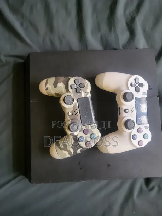 PS4 Console with 2 Controllers and 6 Games - 1