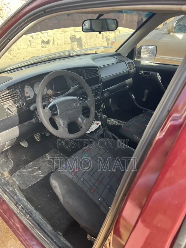 Volkswagen Golf 2003 Maroon - 1