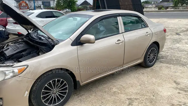 Toyota Corolla 2009 Gold - 1