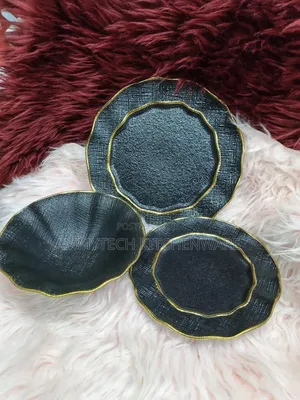 Stylish Black Serving Plates with Gold Rims