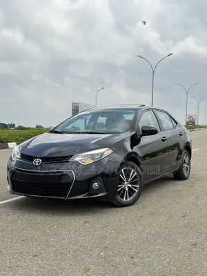 2016 Toyota Corolla LE Premium Sedan - Foreign Used