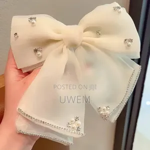 Luxury Princess Hair Bow Clip with Pearl & Stones - Nora Collections