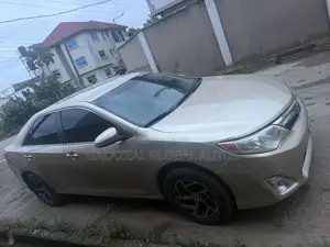 2013 Toyota Camry LE Gold