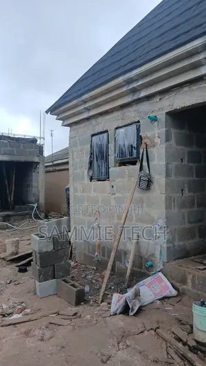 Frameless Window with Inner Burglar Bars & Net