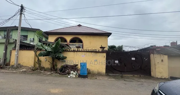 400sqm Land with 2x 2-Bedroom Flats & Bungalow, Ilupeju Estate - 1