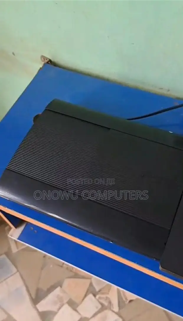 PS3 Super Slim Hacked with 2 Controllers & 56 Games - 1
