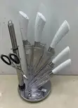 7-Piece Stainless Steel Kitchen Knife Set with Rotating Stand - 1