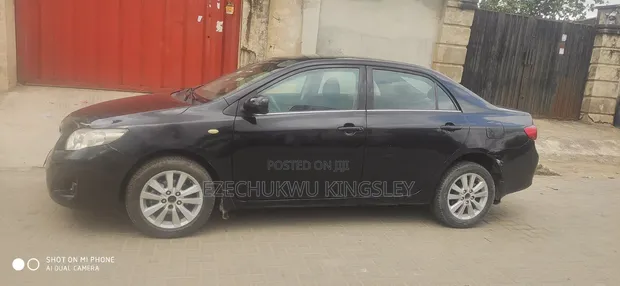 2010 Toyota Corolla XLE Sedan - 1