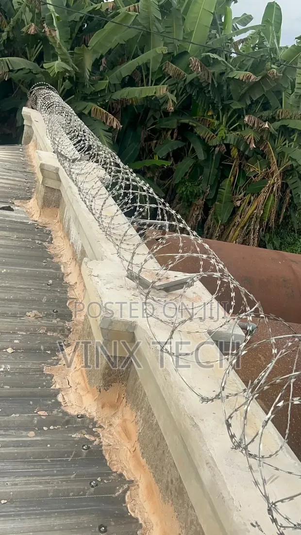 Barb Wire and Electric Fence Installation - 1