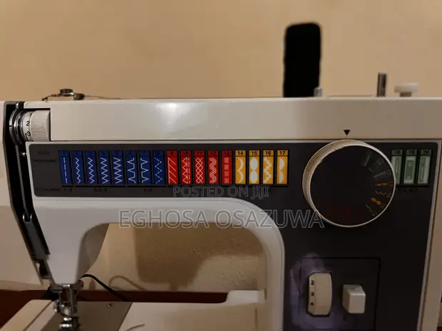 Used Electric Sewing Machine with 20 Stitch Types - 1