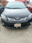Toyota Corolla LE Sedan ta 2010 - 1