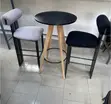 Modern Bar Set: Round Black Table & Upholstered Barstools - 1