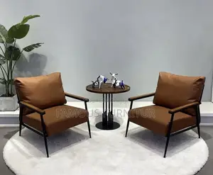 Modern Leather Armchair - Brown Cushion, Black Metal Frame