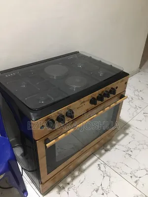 Amfani da Gas Cooker mai 6-Burner tare da Oven & Grill