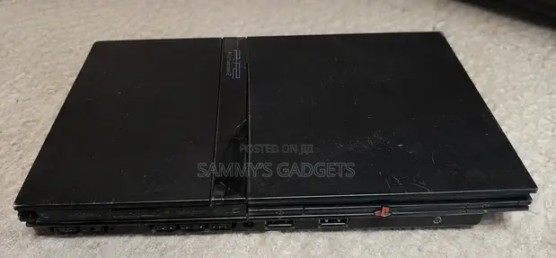 PlayStation 2 Slim with Games - 1