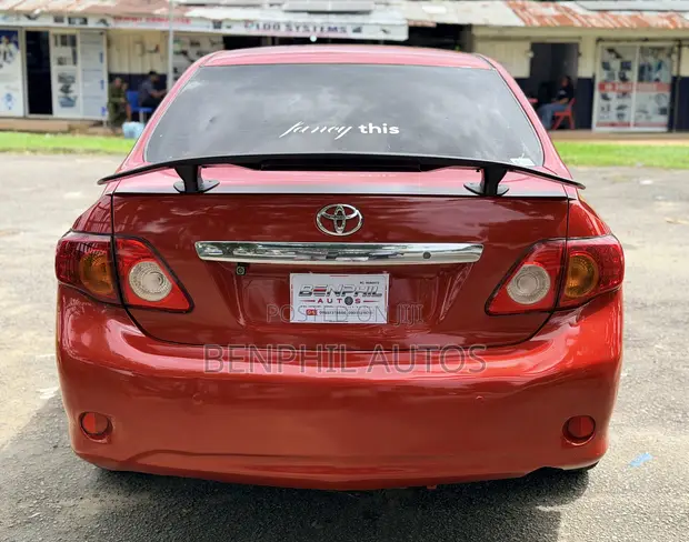 2010 Toyota Corolla LE Sedan - Red - 1