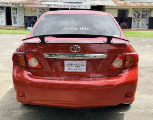 2010 Toyota Corolla LE Sedan - Red