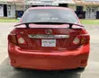 2010 Toyota Corolla LE Sedan - Red - 1