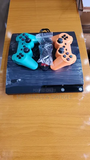 Playstation 3 Slim with 2 Controllers & 10 Games