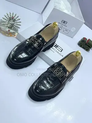Balenciaga Men's Black Leather Loafers with Gold Hardware